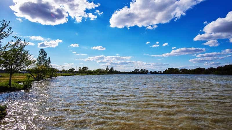 A photo taken from the shore of Canyon Lake