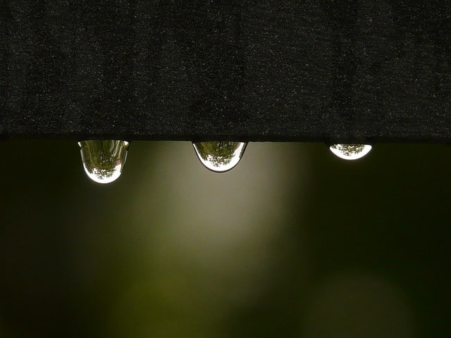Drops off water falling off San Marcos roof