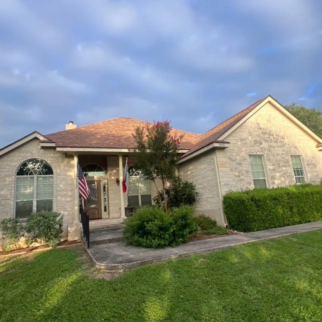 Before: Old brown shingle roof