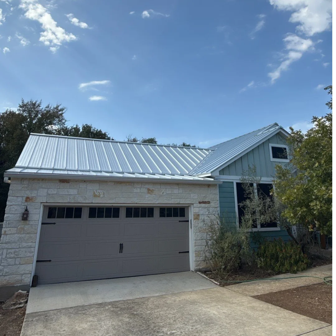 After: Standing seam metal roof