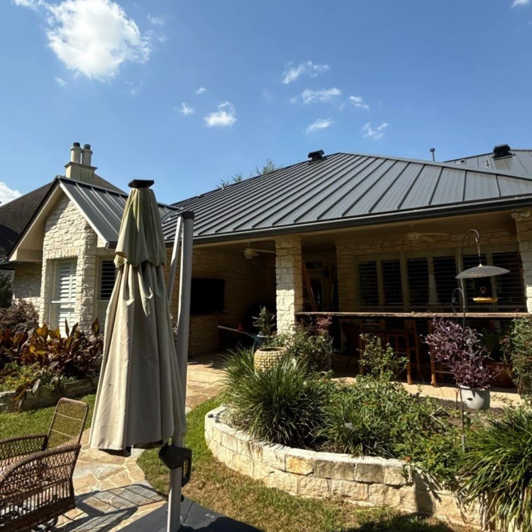After: Charcoal standing seam metal
