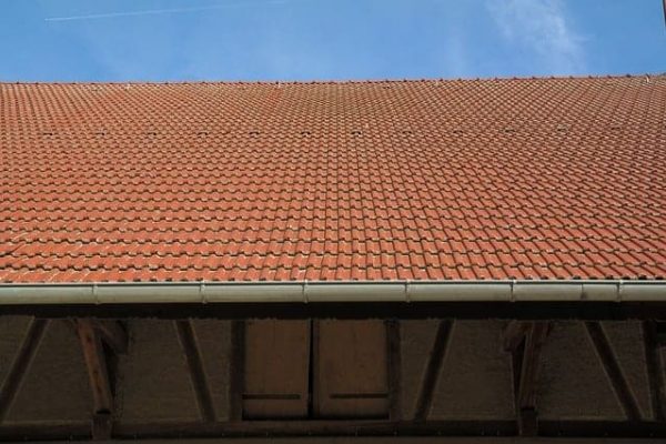 Side view of a home with seamless gutters installed