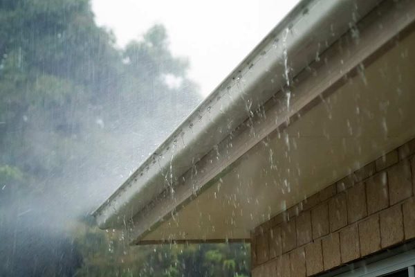 A home's gutter diverts rain water away from the roof.