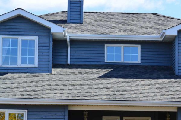 A house with a fresh coat of blue paint.