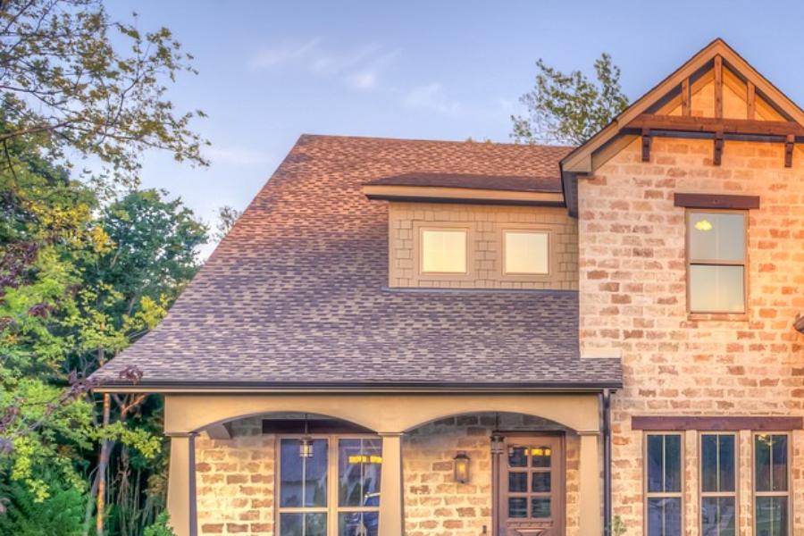 Brown home with shingle roof