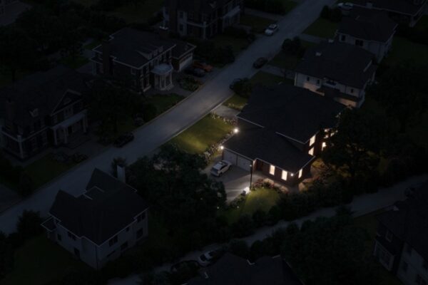 Dark street with power loss and a single lit up home with backup generator and solar batteries in New Braunfels TX