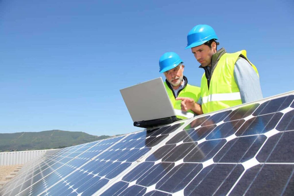business man learning about Kyle TX solar power roof