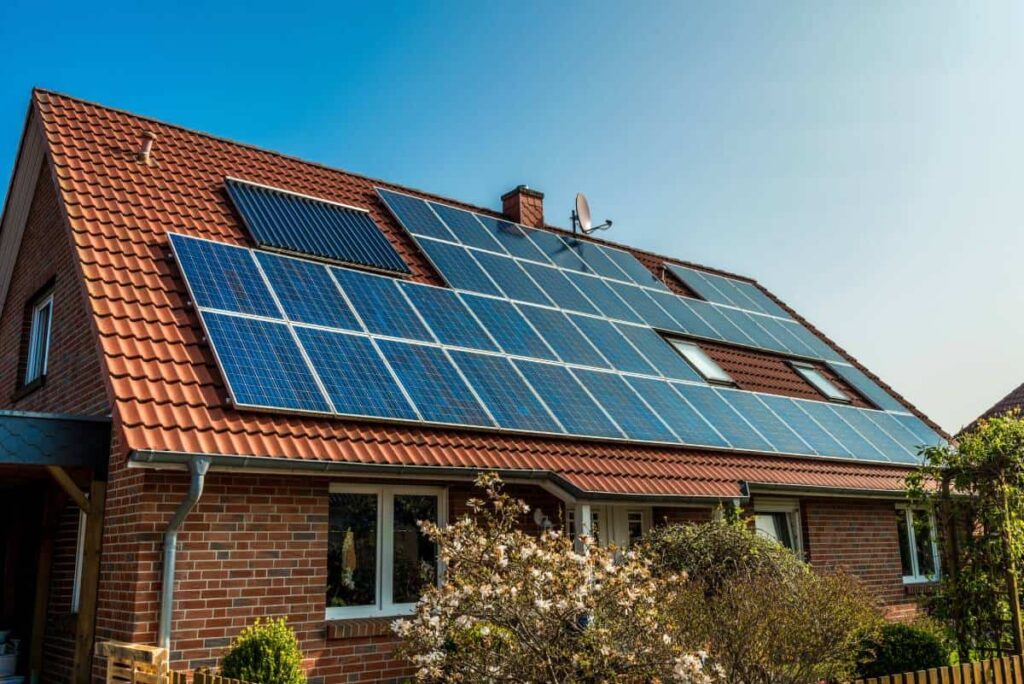 a house with Buda solar panels on the roof